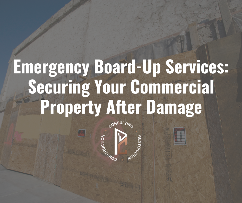 Emergency board-up services securing damaged commercial building with plywood panels after storm damage